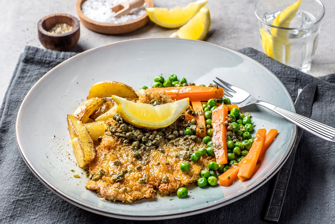 Schnitzel med stekte poteter og kaperssmør