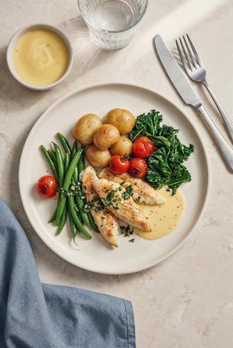 Sauteret kyllingeinderfilet med bagte cherrytomater